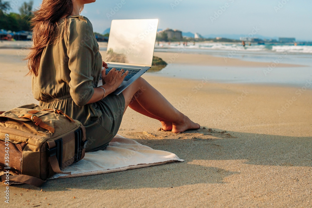 writer on the beach